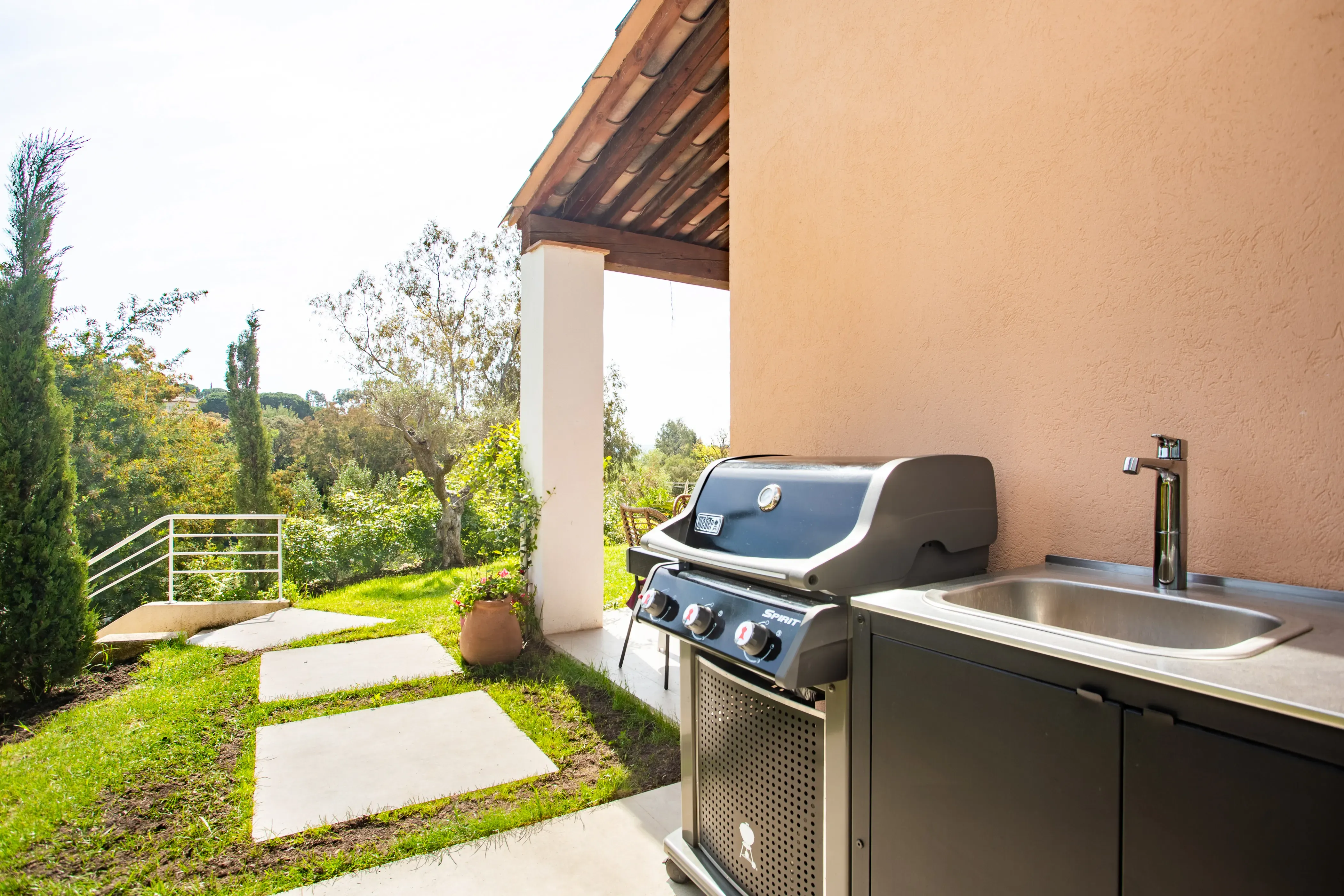 Barbecue area nestled under the pines