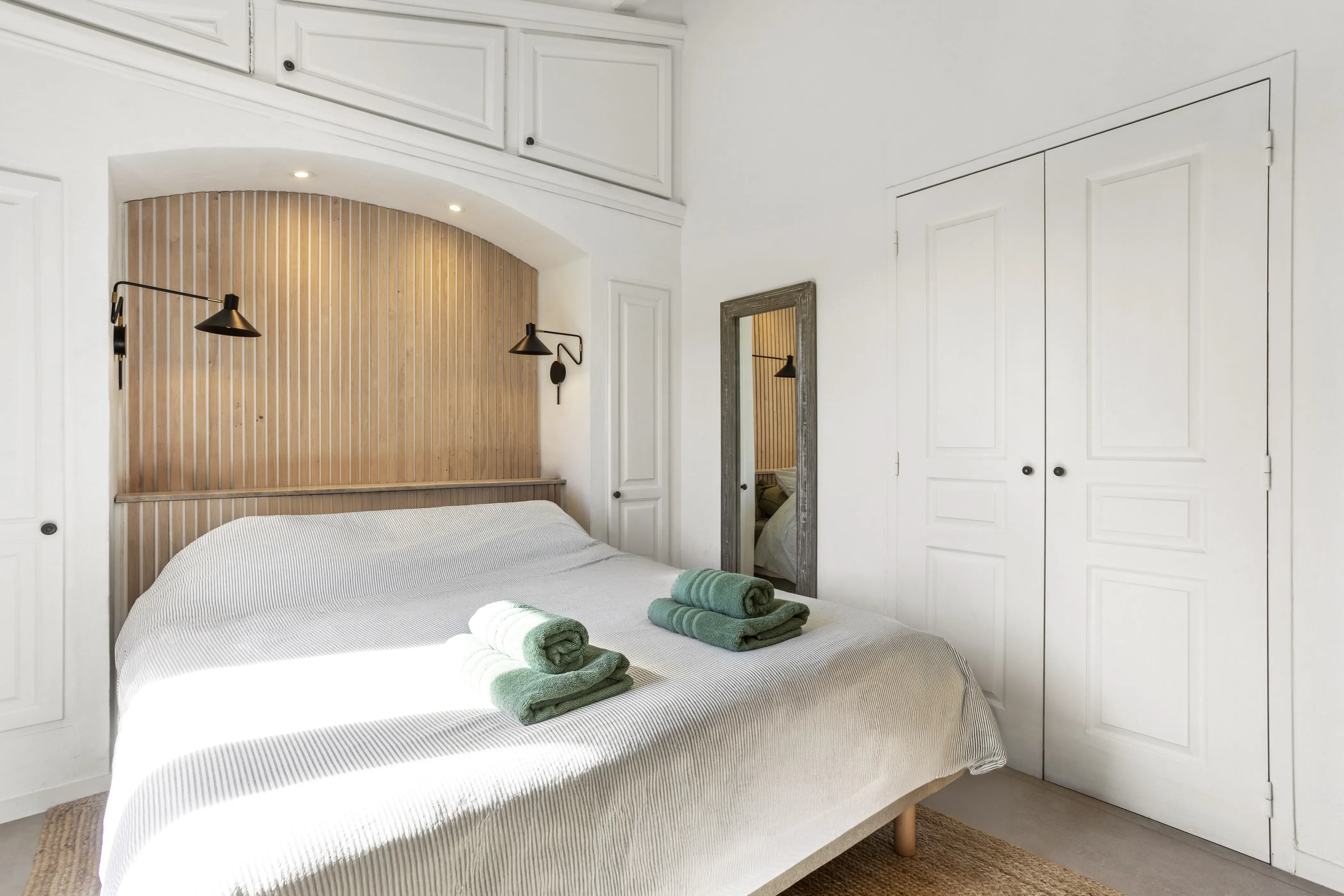Serene master bedroom with soft natural light
