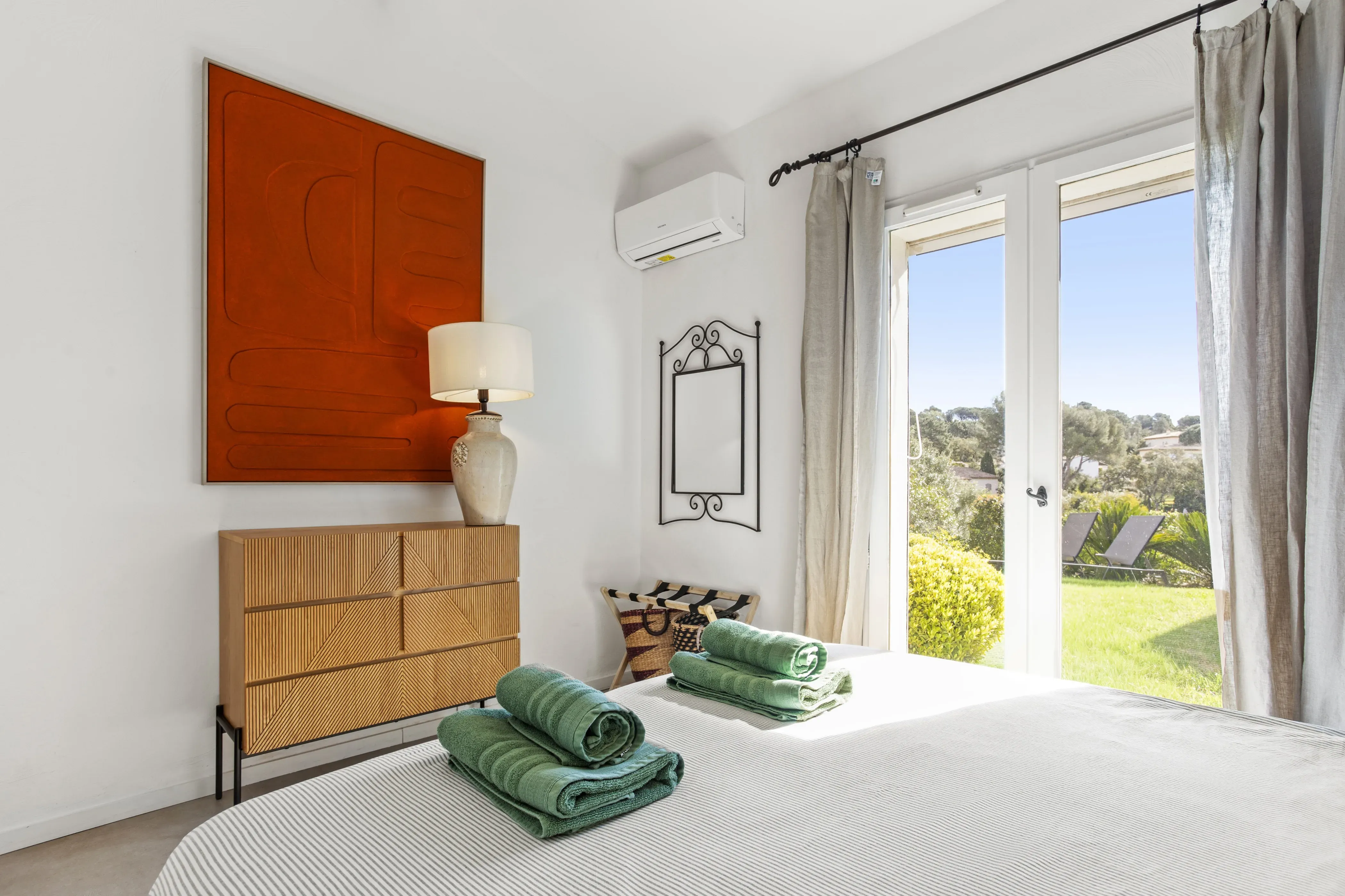 Master bedroom with storage and a peaceful outlook