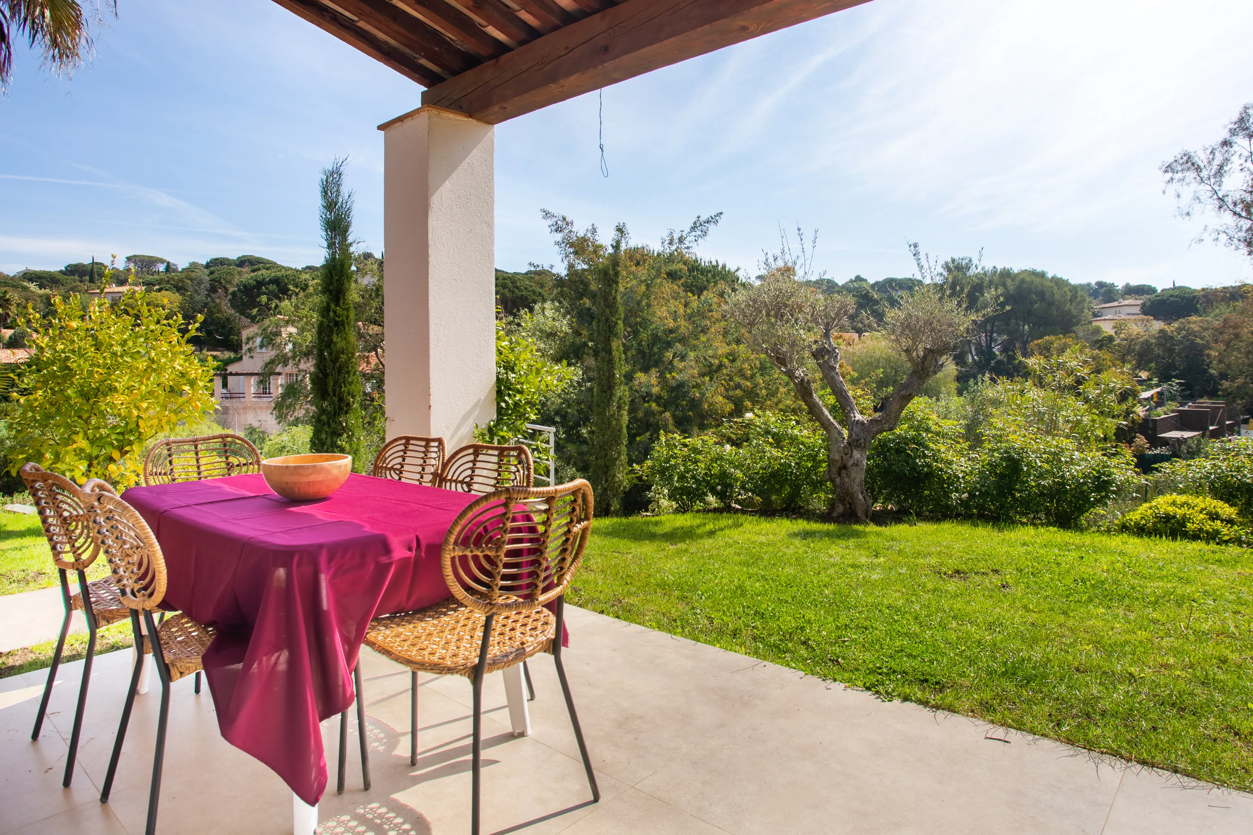 Terrace with sun loungers by the pool